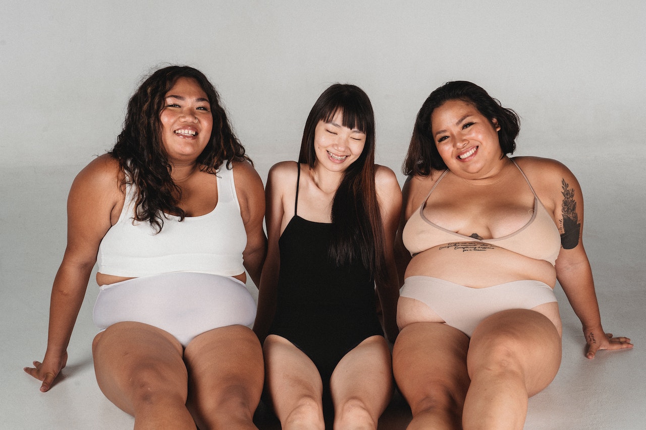 Photo by Roberto Hund: https://www.pexels.com/photo/happy-asian-woman-in-underwear-sitting-in-studio-5317725/