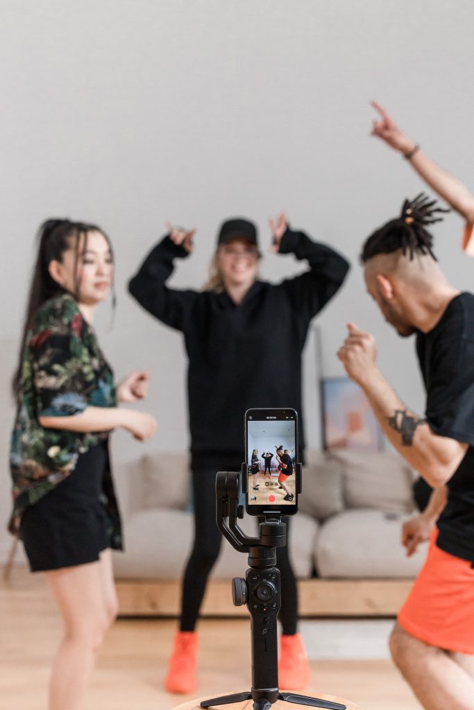 Photo by Ron Lach : https://www.pexels.com/photo/shallow-focus-of-people-recording-a-video-using-a-smartphone-8368353/
