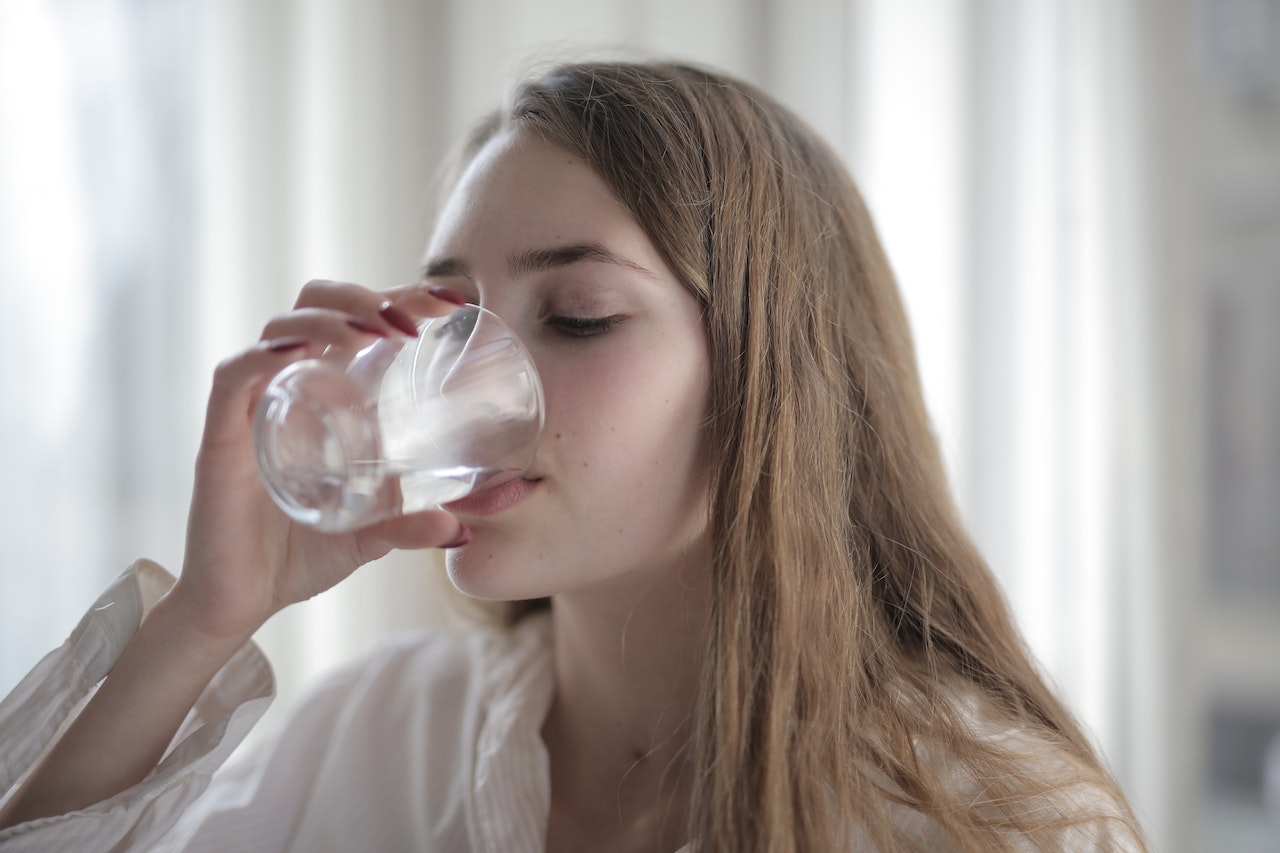 Photo by Andrea Piacquadio: https://www.pexels.com/photo/woman-drinking-water-3794165/